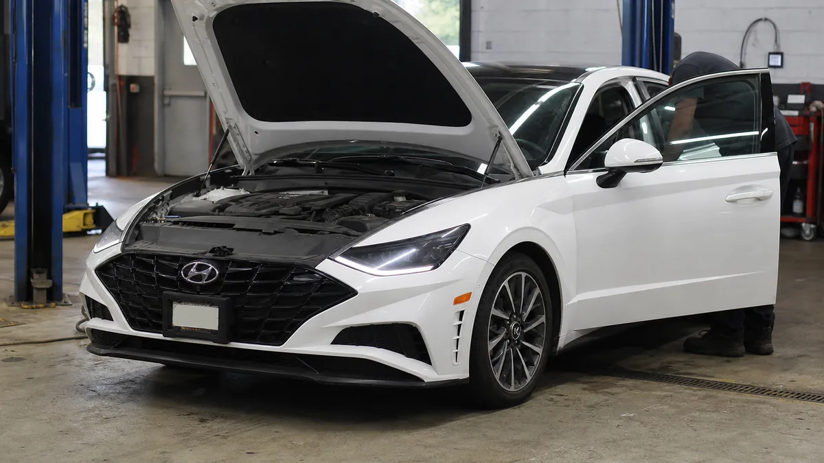 Hyundai Sonata used inspection in a service bay - Hyundai Sonata